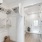 a room with a bed and a shower