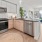 a kitchen with white cabinets