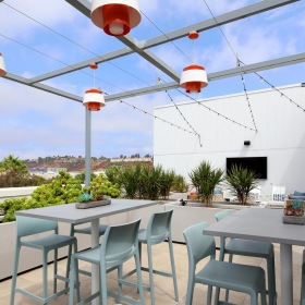 Take advantage of all The Townsend has to offer a patio with tables and chairs