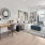 a living room with a large mirror