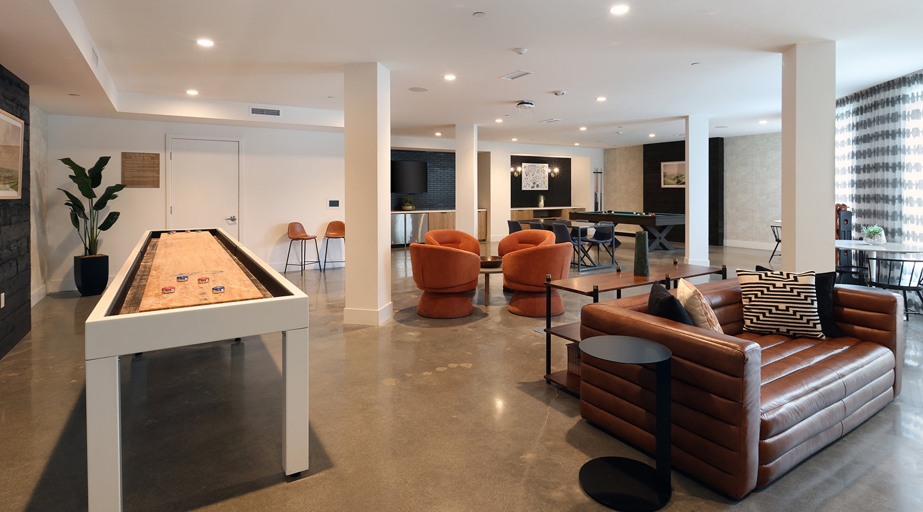 Beautiful clubroom with lounge seating and gaming areas